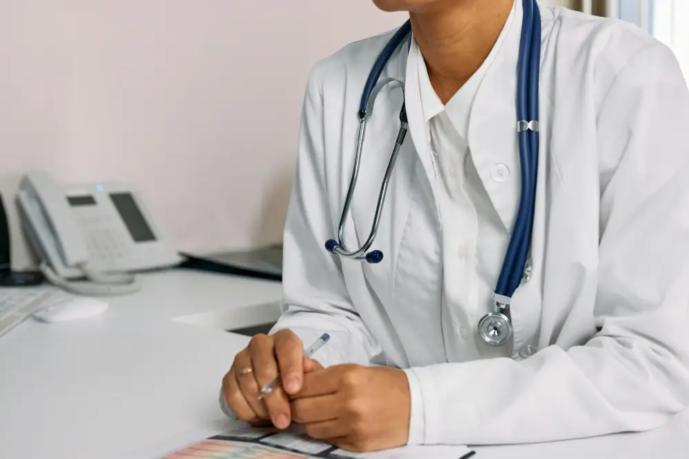 Naturopath reviewing health history and lifestyle factors