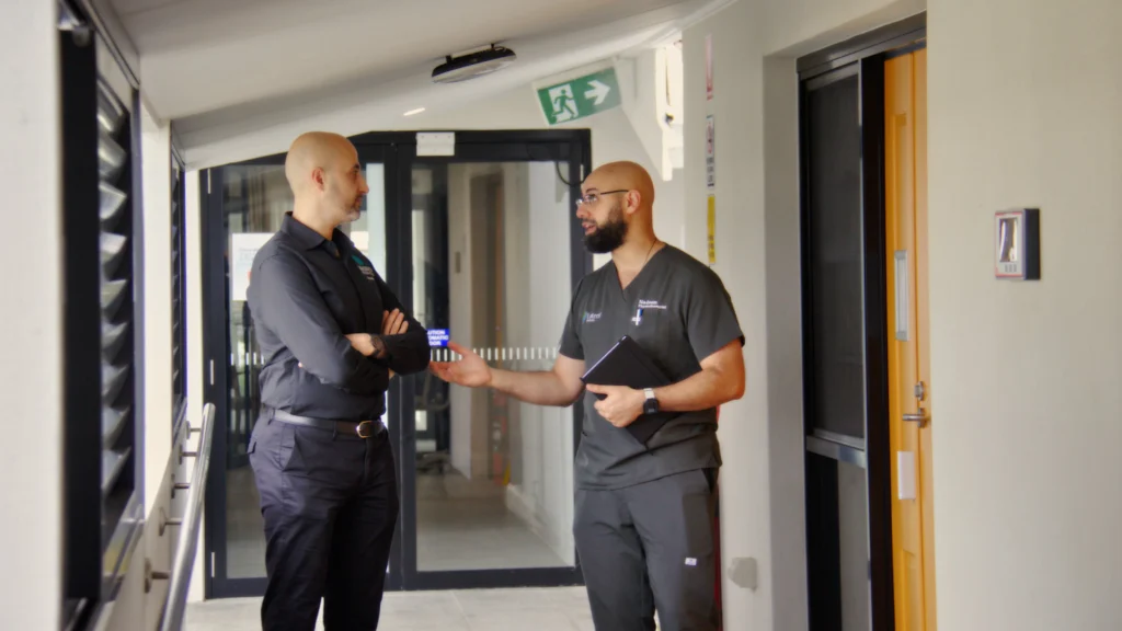 aman-aged-care-staff-consultation-hallway