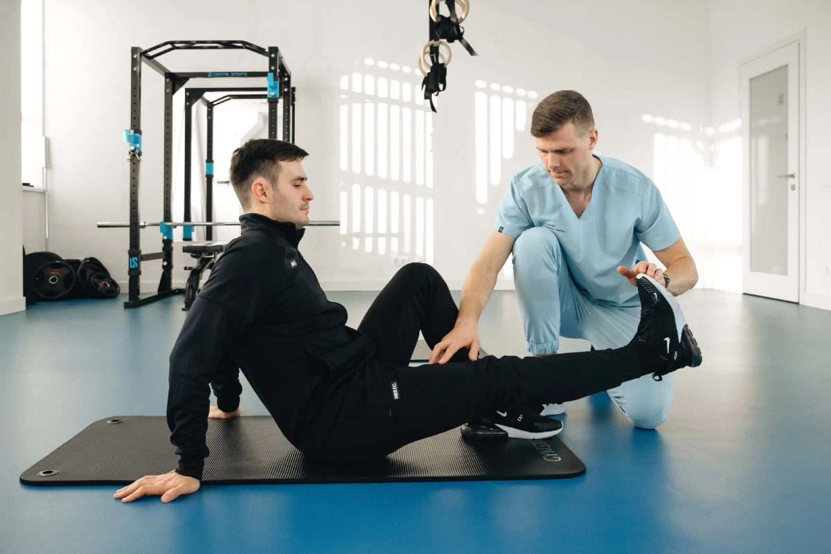 Patient performing movement exercises under professional guidance