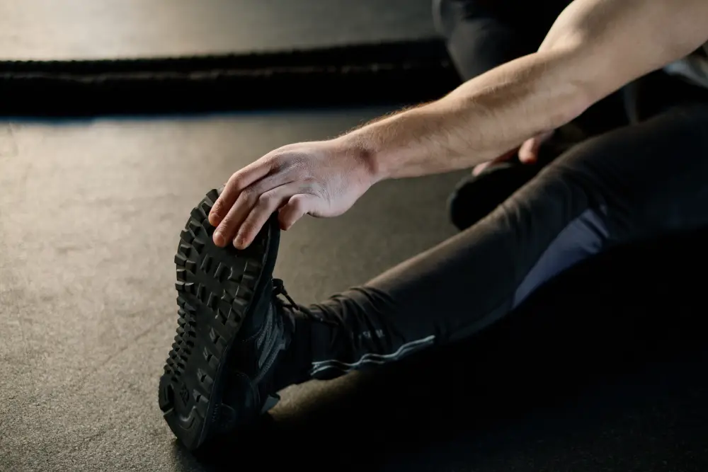 Person performing exercises to improve mobility and movement.