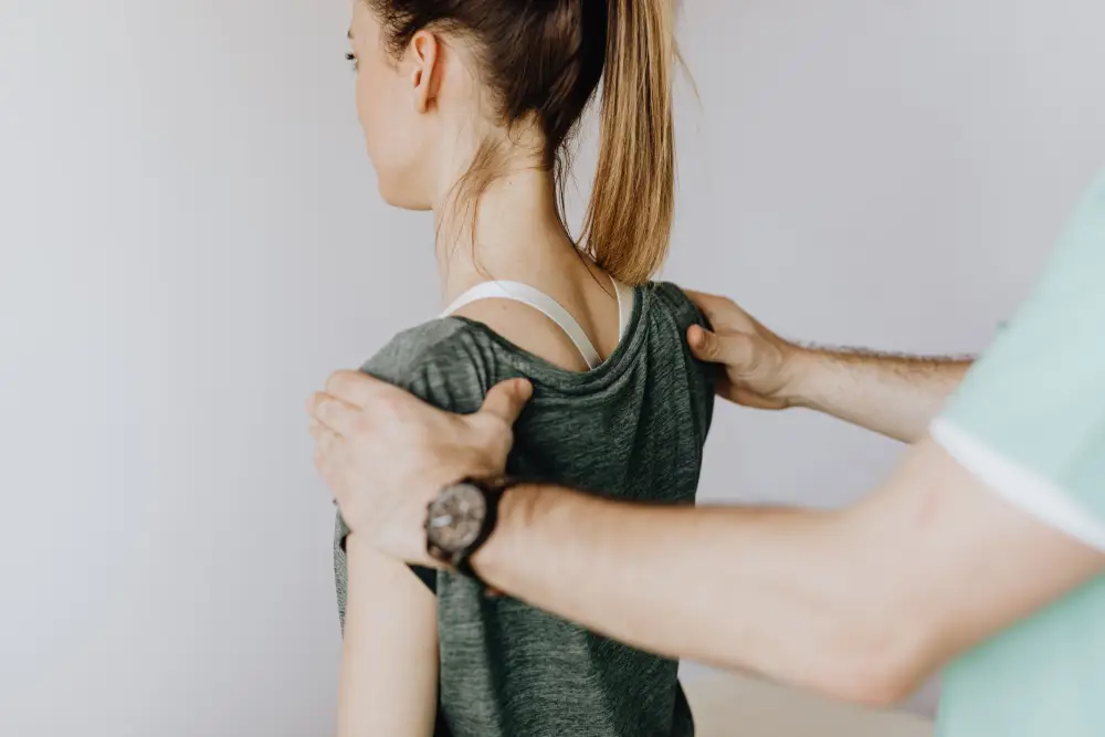 Soft tissue therapy being performed as part of chiropractic treatment.