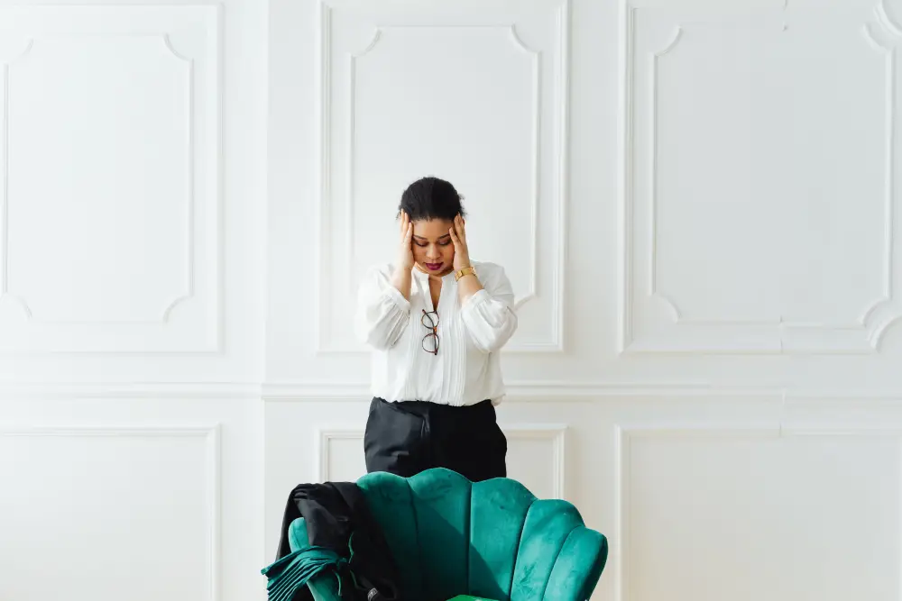Person experiencing dizziness and balance difficulties.